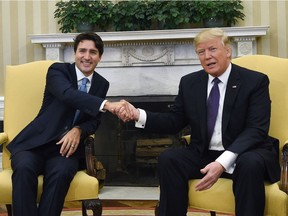 Prime Minister Justin Trudeau meets with U.S. President Donald Trump in the Oval Office of the White House, in Washington, D.C., on Mon. Feb. 13, 2017.