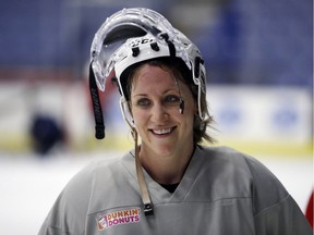 In this Dec. 15, 2016, file photo, U.S. hockey forward Meghan Duggan is seen after a practice session in Plymouth Township, Mich. Women's hockey stars Duggan and Hilary Knight say they aren't concerned about the future of the National Women's Hockey League despite a turbulent second season. The four-team NWHL is the first North American women's hockey league to pay player salaries, but a pair of announcements have brought into question the viability of the league this season. In November, player salaries were cut by half, and then last week, the league announced that this season will be shortened to end before national team players leave for the world championships, which begin March 31.