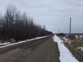 Photo of a dirt road near Meridian Street and 258 Avenue where a woman was found dead in a vehicle on Monday Feb.20, 2017.