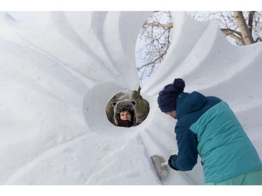 (left to right) Team Norway's Ludo Roders and Elisabeth Kristensen work on a snow sculpture during the Silver Skate Festival in Hawrelak Park, in Edmonton Sunday Feb. 12, 2017. Photo by David Bloom