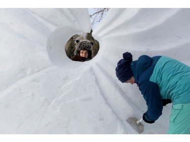 (left to right) Team Norway's Ludo Roders and Elisabeth Kristensen work on a snow sculpture during the Silver Skate Festival in Hawrelak Park, in Edmonton Sunday Feb. 12, 2017. Photo by David Bloom