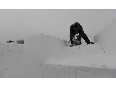 Snow carver Jeremy Mcconville works on snowfortress on Monday February 6, 2017 which is a maze, snow fort that will be ready for the Silver Skate festival, starting on February 10th to the 20th at Hawrelak Park in Edmonton. Greg  Southam / Postmedia  (Standalone photo.)