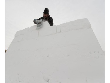 Snow carver Jeremy Mcconville works on snowfortress on Monday February 6, 2017 which is a maze, snow fort that will be ready for the Silver Skate festival, starting on February 10th to the 20th at Hawrelak Park in Edmonton. Greg  Southam / Postmedia  (Standalone photo.)