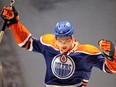 Taylor Hall celebrates after being named the first star in his team's game against the Atlanta Thrashers in Edmonton February 19, 2011. Hall scored a natural hat trick and game winning goal of the 5-3 Oilers win.