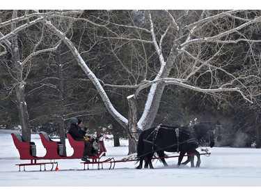 The horse drawn sleigh ride crew getting warmed up for the Silver Skate Festival which started Friday in Edmonton, Friday, February 10, 2017. Ed Kaiser/Postmedia (Standalone Photo)