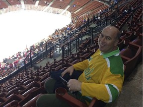 Documentary filmmaker Mark Greczmiel takes in an NHL game in Anaheim.