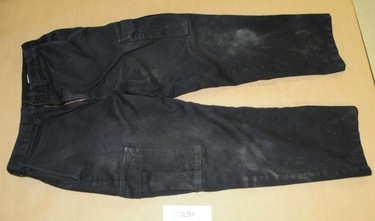 A police photograph of pants worn by Jayme Paseika and seized by Edmonton police following his arrest as the only suspect in a deadly mass stabbing in an Edmonton warehouse on Feb. 28, 2014. The photograph was entered as an exhibit in Pasieka's jury trial on Feb. 21, 2017.