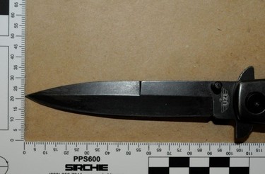 A photograph of a knife that Edmonton police seized on the day of an alleged stabbing spree at a west-Edmonton warehouse on February 28, 2014.