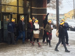 Participants in Hope Missions’s Coldest Night of the Year march outside in the light snow and chilly weather to begin the walk. Nathan Martin/Postmedia