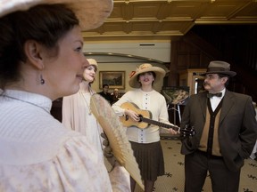 Costumed Fort Edmonton Park employees entertain visitors in the Selkirk Hotel before a news conference to announce federal funding for the park's $165-million expansion plan Friday, March 3, 2017. The project will include an indigenous peoples experience, more 1920s midway rides, and a new park entrance.