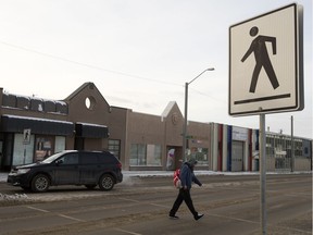 Traffic moves through the 101 Street and 105A Avenue intersection, in Edmonton Thursday, March 9, 2017. City administration has put forward a list of 70 top-priority crosswalks out of 380 that need updating, including the intersection at 101 Street and 105A Avenue. A report is slated to go before the community and public services committee on March 13.