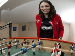 Team Canada foosball player Zoe LaBelle, 24,  poses for a photo in the basement of her Sherwood Park home, Sunday, March 26, 2017. LaBelle is off to Hamburg, Germany to play in the foosball World Cup.