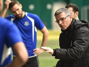 FC Edmonton head coach Colin Miller instructs his players during halftime against the University of Alberta Golden Bears during an exhibition game between the two teams at Foote Field in Edmonton, Tuesday, March 7, 2017. FC Edmonton recently returned from a preseason tour of England.