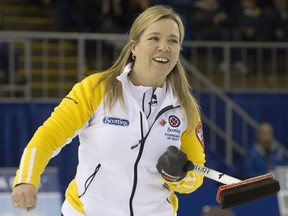 Manitoba skip Cathy Overton-Clapham smiles after making a shot against Team Canada in the night draw at the 2011 Tournament of Hearts in Charlottetown, P.E.I. on Feb. 23, 2011. Veteran curler Cathy Overton-Clapham has joined Chelsea Carey&#039;s curling team. Carey announced the move Wednesday on her team&#039;s Twitter account and said Overton-Clapham will compete with them in 2017-18. THE CANADIAN PRESS/Frank Gunn