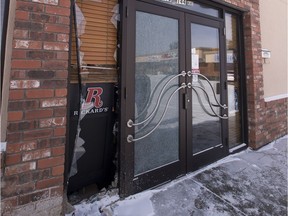 A broken window at Capital Pizza at 7640-144 Ave. is evidence that an ATM machine was stolen from the business in the early morning on Wednesday, March 8, 2017 in Edmonton.