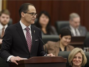 Alberta Finance Minister Joe Ceci, left, speaks alongside Premier Rachel Notley as he tables Budget 2017 in the Alberta Legislature in Edmonton on March 16, 2017.