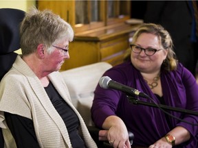 Minister Sarah Hoffman, right, with home care recipient Jaye Fredrickson, addresses how the government will improve life for Albertans whose independence is limited by physical or mental conditions on March 20, 2017 in Edmonton.
