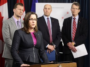 The Wildrose's Angela Pitt (front), the Progressive Conservative's Mike Ellis (back left), Alberta Party's Greg Clark, and the Alberta Liberal's Dr. David Swann (right) take part in a joint press conference to call on the government to take immediate action to address the current opioid crisis, at the Alberta legislature in Edmonton Monday, March 6, 2017.