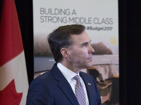 Minister of Finance Bill Morneau speaks during a press conference at the media lock-up, before tabling the budget in the House of Commons on Parliament Hill, in Ottawa on Wednesday, March 22, 2017.