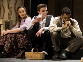 Monika Dyjak, left, Mathew Hackett and Nathan Tesfaye take part in Oscar Romero High School's dress rehearsal for their production of Village of Idiots, in Edmonton on Wednesday, March 8, 2017.