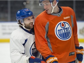 Newly acquired David Desharnais skates with teammate Eric Gryba his first Edmonton Oilers practice following Wednesday's trade deadline. The two are 21 cm apart in height. (Shaughn Butts)