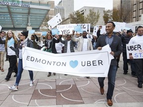 Edmonton transit riders could see partnerships with ridesharing or taxi companies such as Uber fill the gap when community bus service is reduced.