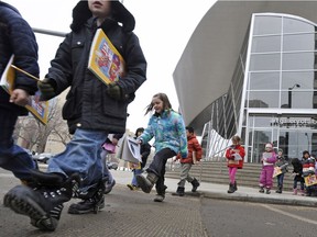 A group of kids walking to Churchill Square to sketch while participating in an Art Gallery of Alberta camp during spring break in 2011.