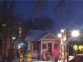 Edmonton Fire Rescue Services battle a blaze at 107 Avenue and 125 Street in a vacant bungalow on the evening of Saturday, March 11, 2017. Seven units were called out to fight the fire, which started in the home's basement.