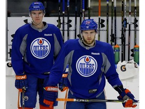 Edmonton Oilers forward Leon Draisaitl (right) and captain Connor McDavid practise in Edmonton on Monday, March 27, 2017. (Larry Wong)