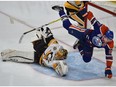 Edmonton Oilers Connor McDavid (97) goes air borne after rushing at Pittsburgh Penguins goalie Marc-Andre Fleury (29) during first period NHL action at Rogers Place in Edmonton, Saturday, March 10, 2017. Ed Kaiser/Postmedia (Edmonton Journal story by Jim Mathseon) Photos off Oilers game for copy in Saturday, March 11 editions.