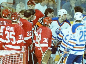 Players from the Edmonton Oilers and the Detroit Red Wings behind the visiting Wings net on March 14, 1986, at Edmonton's Northlands Coliseum.