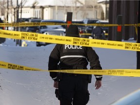 Edmonton Police Service officers investigate a shooting near Hollands Way in the Hodgson neighbourhood of Edmonton on Thursday, March 9, 2017.