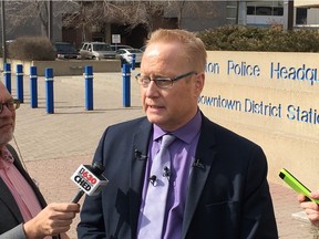 Edmonton police spokesman Scott Pattison, at police headquarters in Edmonton on March 29, 2017, asks for the public's help in solving the murders of Irfan Ahmed Qureshi, 37, and Suzanne Marie Tran, 27, who were found dead on March 23, 2016.