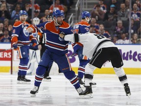 Edmonton's Patrick Maroon (19) fights LA's Jarome Iginla (88) during the second period of a NHL game between the Edmonton Oilers and the LA Kings at Rogers Place in Edmonton on March 20, 2017.