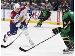 Edmonton's Trey Fix-Wolansky (left) fires a shot past Prince Albert's Vojtech Budik during a WHL game between the Edmonton Oil Kings and the Prince Albert Raiders at Rogers Place  in Edmonton on Saturday, January 21, 2017.