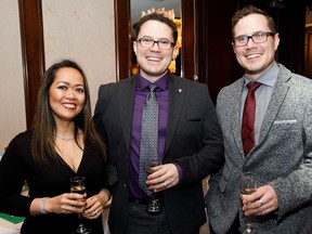 Hermie Fehr, left, Marc Fehr and Mat Fehr pose together during the Defying Limitations Gala at the Chateau Lacombe in Edmonton on Saturday, Feb. 25, 2017.