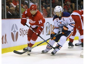 Detroit Red Wings right wing Gustav Nyquist (14) of Sweden skates against Edmonton Oilers right wing Jordan Eberle (14) during the third period of an NHL hockey game in Detroit, Sunday, Nov. 6, 2016. The Oilers defeated the Red Wings 2-1. The Oilers host the Red Wings on Saturday at Rogers Place.