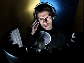 Actor Mark Meer poses for a photo in the sound recording booth at the local video game developer BioWare, in Edmonton. Meer is the voice actor who plays Commander Shepard in the new Mass Effect 3 video game.