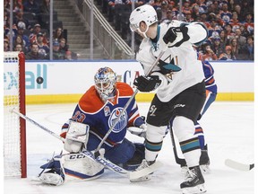 San Jose Sharks forward Jannik Hansen scores on Edmonton Oilers goalie Cam Talbot in Edmonton on Thursday, March 30, 2017. (Jason Franson/The Canadian Press)