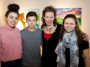 Josie Coyes-Loiselle, left, Dezmond Coyes-Loiselle, Annette Loiselle and Lilianna Coyes-Loiselle pose together during the SkirtsAfire opening at the Nina Haggerty Centre for the Arts in Edmonton on Thursday, March 9, 2017.