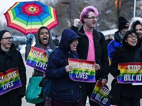 Protesters demonstrate in favour of gay-straight alliances at the Alberta legislature on Dec. 4, 2014.