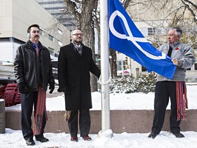 A Metis flag raising ceremony in 2014. Edmonton will now fly the Metis Nation flag all year.