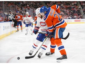 Leon Draisaitl of the Edmonton Oilers battles against Phillip Danault of the Montreal Canadiens at Rogers Place in Edmonton on March 12, 2017. (Getty Images)