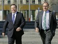 Newly-elected Alberta Progressive Conservative Party Leader Jason Kenney (left) and former interim party leader Ric McIver (right) walk outside the Federal Building in Edmonton on Monday March 20, 2017 after Kenney met with Alberta WIldrose Party Leader Brian Jean.