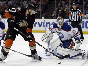 Anaheim Ducks left wing Nick Ritchie (37) takes a shot against Edmonton Oilers goalie Cam Talbot (33) during the second period of an NHL hockey game in Anaheim, Calif., Wednesday, March 22, 2017.