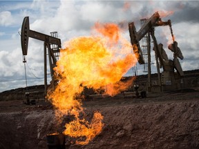 A gas flare is seen at an oil well site outside Williston, North Dakota. File photo.
