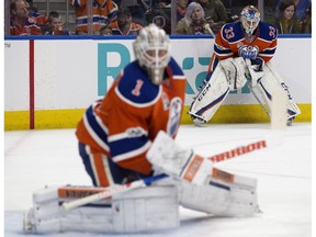 The Edmonton Oilers' goaltender Cam Talbot (33) watches goaltender Laurent Brossoit (1) take part in the pre-game warmup against the Colorado Avalanche at Rogers Place, in Edmonton on Saturday, March 25, 2017. Photo by David Bloom Photos off Oilers game for copy in Tuesday, March 21 editions.
