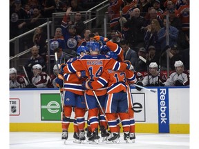 The Edmonton Oilers celebrate Benoit Pouliot's goal against the Colorado Avalanche at Rogers Place in Edmonton on Saturday, March 25, 2017. (David Bloom)