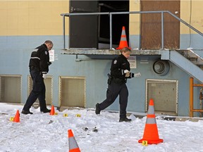 Police investigate a shooting outside Connect Ultra Lounge in Edmonton on March 14, 2017. A male was hospitalized after being shot multiple times.