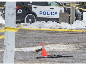 Police look for evidence after an Edmonton police officer shot a man kneeling in the middle of a north end intersection who was holding a rifle. The scene was at 50 Street and 137 Avenue on March 13, 2017